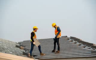 Construction worker wearing safety harness belt during working