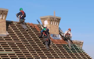 Man working on the new roof