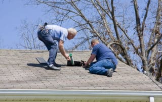 Repairing damaged roof on home